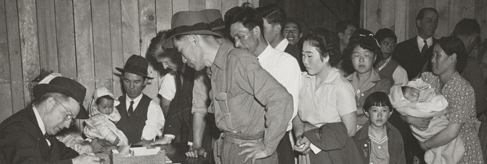 Attendants register arrivals at Santa Anita Park Assembly Center, April 5, 1942, Photo by Clem Albers, The Bancroft Library UC Berkeley