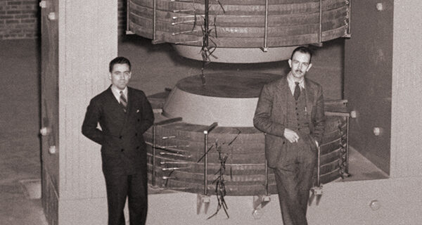 Indiana cyclotron with Larry Langer and Franz N.D. Kurie April 20, 1940, photo by Donald Cooksey, Lawrence Berkeley National Laboratory